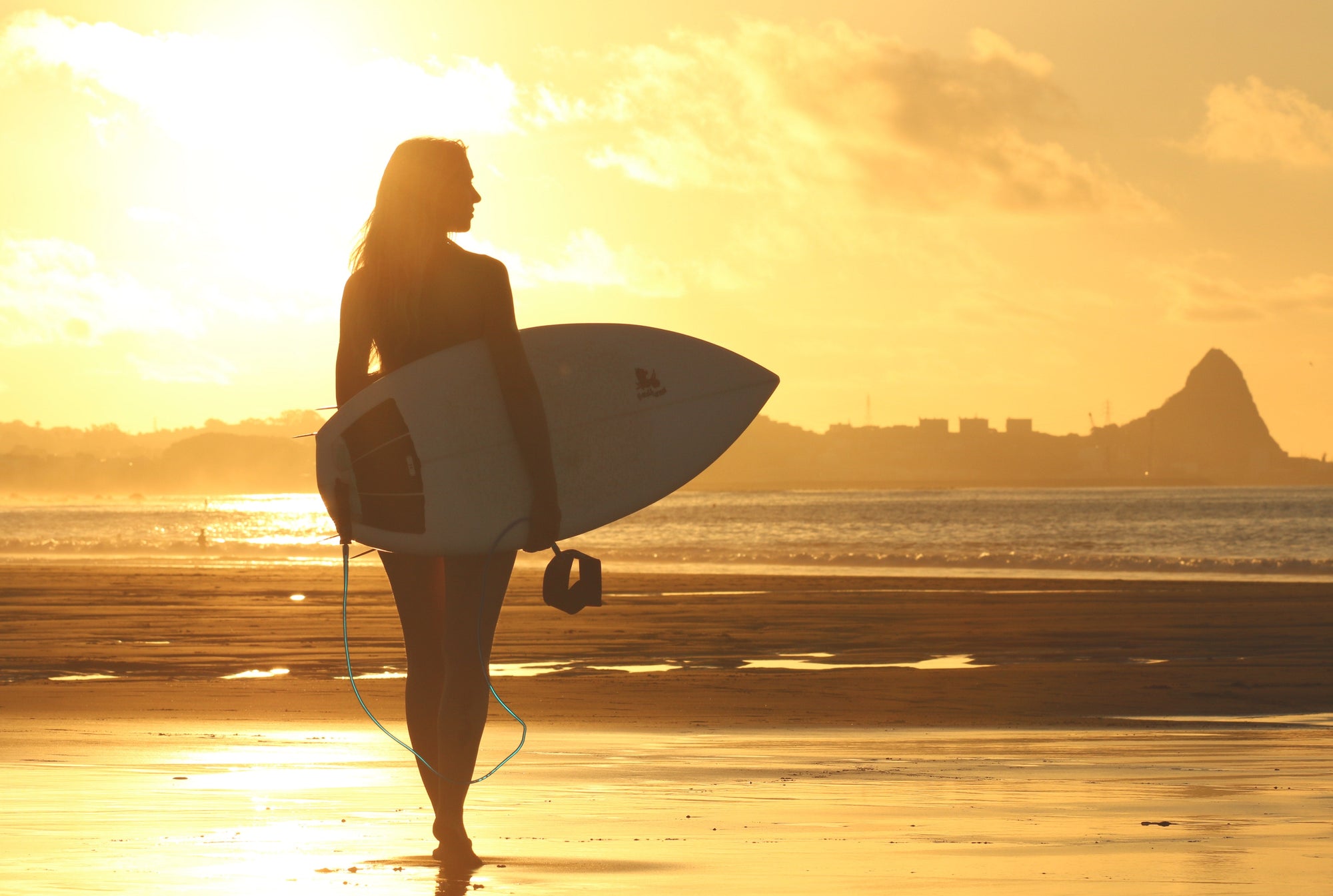 How to Carry Your Surfboard